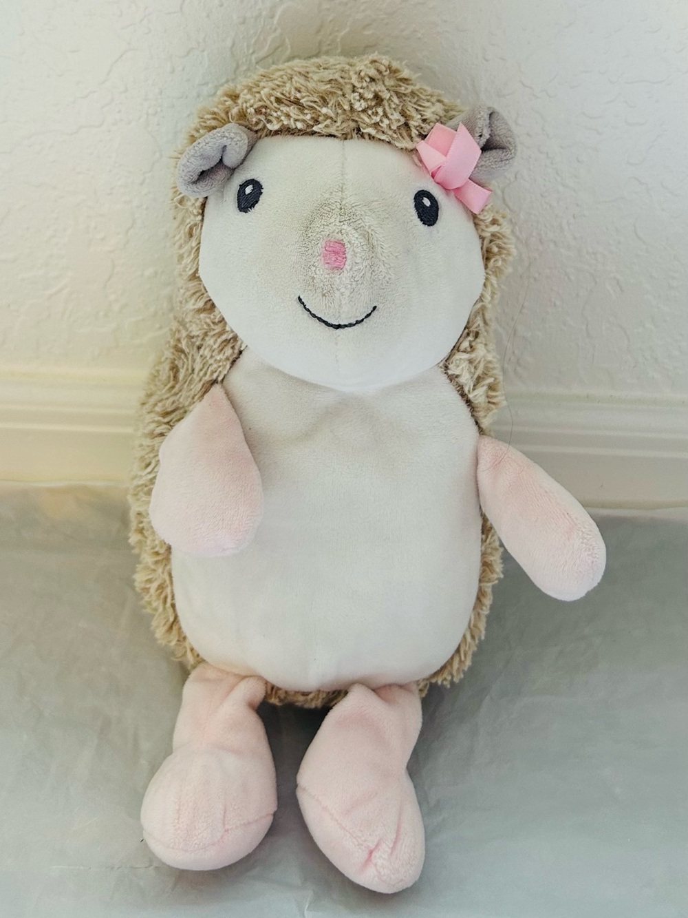 Blankets & Beyond Plush Hedgehog in Tan and Pink